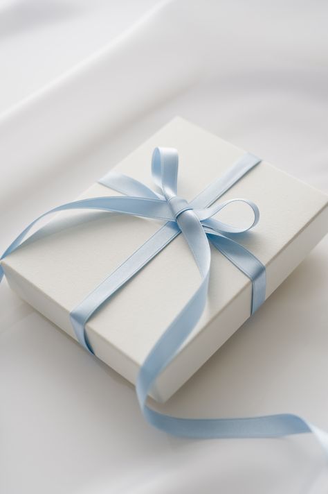 A blue satin bow wrapped around a white box is the chicest way to wrap a gift for any occasion. Blue Aesthetics, Baby Blue Aesthetic, Light Blue Aesthetic, Good Color Combinations, Blue Aesthetic Pastel, Bleu Pastel, Blue Gift, Aesthetic Colors, White Box