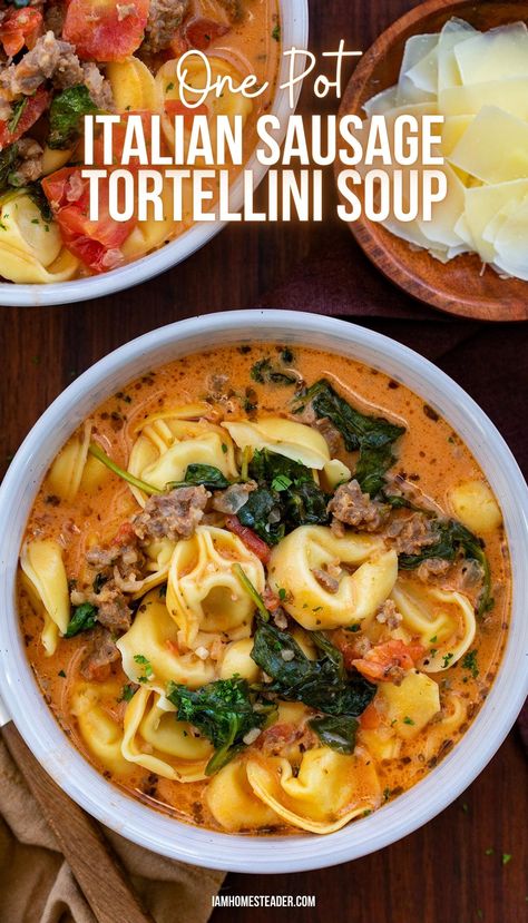 A white bowl filled with Italian Sausage Tortellini Soup, next to it, a second bowl of soup and a wooden bowl of shaved parmesan cheese. Tortellini Soup With Sausage And Arugula, Keto Sausage Tortellini Soup, Tortilla Sausage Soup, Creamy Sausage Spinach Tortellini Soup, One Pot Italian Sausage Tortellini Soup, Spinach Tortellini Sausage Soup, Soup Sausage Tortellini, One Pot Tomato Basil Tortellini Soup, Tortellini Veggie Soup