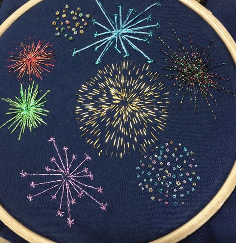 An image of a firework embroidery on navy blue fabric stitched with metallic threads Diy Embroidery Letters, Stitch Portrait, Printable Cross, Eight Pointed Star, Stitch Crafts, Stitch Diy, Fireworks Design, Ideas Embroidery, Love Embroidery