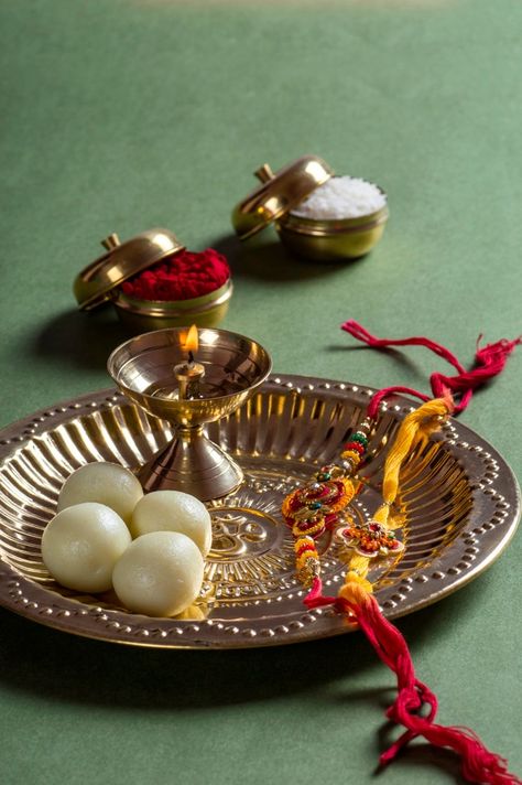 Indian festival: Raksha bandhan or rakhi with an elegant rakhi and diya. Download it at freepik.com! #Freepik #photo #celebration #event #rice #indian Rakhchha Bandhan, Rakhi Photo Shoot Ideas, Rachhabandan Photo, Rakhi Images Hd, Rakhi Bandhan Images, Racha Bandhan, Raksha Bandhan Ka Photo, Rakha Bandhan Photo, Raksha Bandhan Decoration At Home