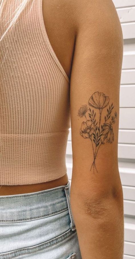 Birth Flower Back Of Arm, Birth Flowers Arm Tattoo, Birth Flower Tattoos Bicep, Back Arm Flower Tattoo Women, Woman Arm Flower Tattoo, Outer Arm Flower Tattoo, Tattoo Back Of Upper Arm, Back Of Arm Birth Flower Tattoo, Floral Tattoo On Back Of Arm