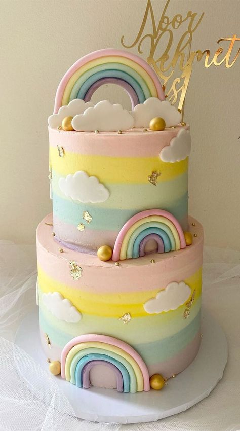 Two Tier Pastel Rainbow Cake, First Birthday Cake Pastel Colors, Pastel Rainbow Birthday Cake 2 Tier, Birthday Cake Rainbow Pastel, Rainbow On Cake, Cake Designs For Baby Girl 1st Birthday, Rainbow Theme Cake 1st Birthdays, Sky Cake Cloud, Pastel Rainbow Unicorn Cake