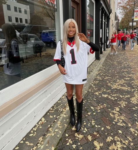 Cold Sec Gameday Outfit, Buccaneers Game Day Outfit, Football Jersey And Cowboy Boots Outfit, Cute Fall Football Game Outfits, Football Game Day Outfit Cold, Texas Tailgate Outfit, Falcons Game Day Outfit Woman, Cowgirl Boots Football Game Outfit, Chilly Game Day Outfit