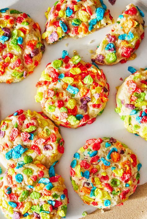 Fully embrace your childhood with these fun Fruity Pebbles Cookies. The cookies themselves are similar to a sugar cookie and a cornflake cookie, if the two combined. They have the crunchy texture of a cornflake cookie, but each cookie is still soft and supple like a sugar cookie. And of course, instead of sprinkles, we use cereal. For a birthday party or after-school treat, these fun cookies can't be beat. #cookies #fruitypebbles #fruitypebblescookies #kidcookies #cerealcookies Chocolate Cereal Cookies, Fruit Loop Cookies, Fruit Pebble Cookies, Recipes Using Fruity Pebbles, Poptart Cookie Recipes, Cookies Made With Cereal, Fruity Pebble Cookies Recipes, Weird Cookie Flavors, Best Cookie Swap Cookies