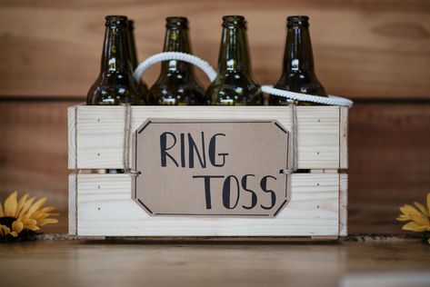 DIY Engagement Ring Toss Gamecountryliving Engagement Party Games Activities, Diy Engagement Ring, Outdoor Engagement Party, Wedding Bingo, Engagement Party Themes, Wedding Mad Libs, Engagement Party Games, Wedding Photo Booth Props, Fun Bridal Shower Games