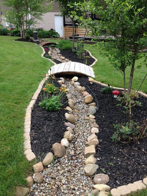 Dry River Bed Landscaping Ideas To Try In 2022 - A Nest With A Yard Garden With Rocks, Dry Riverbed Landscaping, Dry River Bed, Yard Drainage, Cheap Landscaping Ideas, Dry River, River Rock Landscaping, River Bed, Rock Garden Landscaping