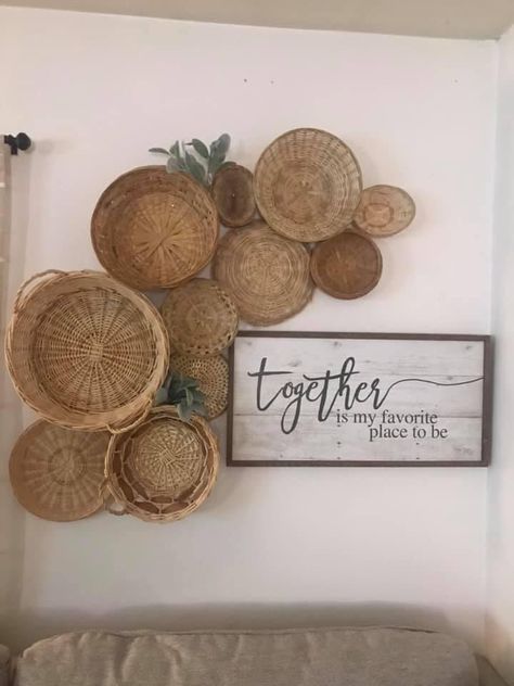 Assorted Mirrors On Wall, Boho Wall Ideas Bedrooms, Woven Baskets On Wall Dining Room, Boho Basket Wall Around Tv, Wicker Basket Wall Art With Plants, Basket Wall With Sign, Basket Wall With Greenery, Boho Wicker Wall Decor, Wall Baskets Around Picture