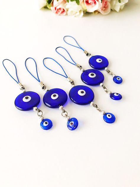 Car rear view mirror charm, glass evil eye bead, evil eye charm, blue evil eye, turkish evil eye beads, glass evil eye, mirror decor #accessories #nazarboncuk #evileyecharm #carmirrordecor #carrearviewmirror #glassevileye #evileyebead #evileye #blueevileye #blueeyes #evileyedecor Evil Eye Keychain Diy, Adjustable Evil Eye Beads As Gift, Mobile Charms, Evil Eye Amulet Jewelry For Festival, Bead Evil Eye, Eye Mirror, Evil Eye Car Charm, Car Mirror Decorations, Car Charms Rear View Mirror