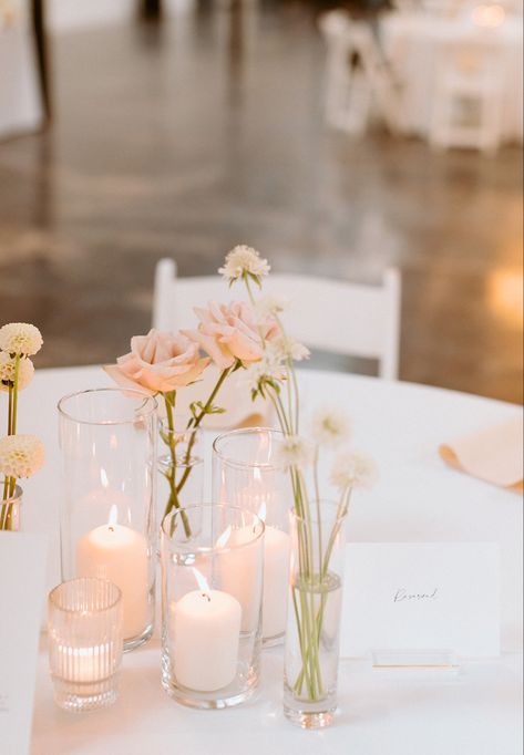 Wedding Tables Simple Decorations, Simple Floral And Candle Centerpieces, No Floral Centerpieces, Simple Fall Wedding Centerpieces Cheap, Blush Candles Wedding, Wedding Flowers Simple Table, Wedding Candles And Bud Vases, Light Pink Wedding Table Decor, Classic Wedding With Pop Of Color