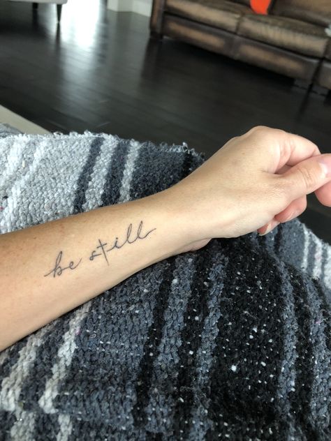 Tattoo, be still and know, “Be still in the presence of the Lord, and wait patiently for Him to act. Don’t worry about evil people who prosper or fret about their wicked schemes.” ‭‭Psalms‬ ‭37:7‬ ‭NLT‬‬ Be Still And Know Tattoo With Cross, Lord I Need You Tattoo, Worry Tattoo Ideas, Be Still Hand Tattoo, Tattoo Be Still And Know, Scripture Tattoo Ideas For Women, Be Still Bible Verse Tattoo, He Is Enough Tattoo, Worry Less Tattoo