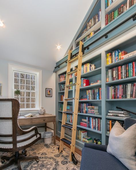 Feature Friday! Maximize your office storage with built-in bookcases and create your own little library. 📚📖🪜 #featurefriday #office #library #bookshelf #mjginteriors #happyhome #interiordesigner #designyourhome #designhome #homerenovation #housegoals #homedesign #decorateyourhome Built In Bookcase Sloped Ceiling, Vaulted Ceiling Built Ins Bookshelves, Sloped Ceiling Bookcase, Floor To Ceiling Bookshelves, Library Bookshelf, Angled Ceiling, Feature Wall Living Room, Study Vibes, English Library