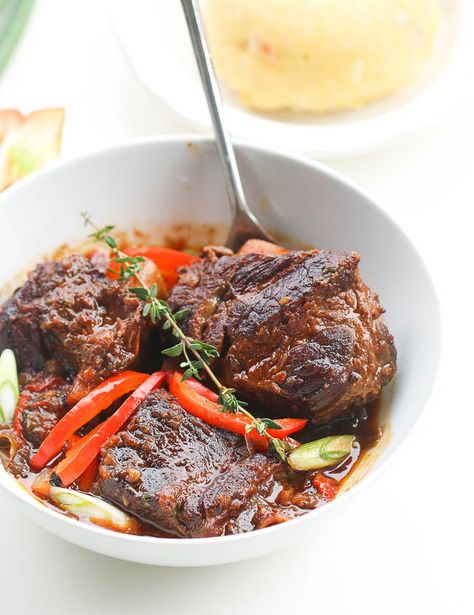 Jamaican Brown Beef Short Ribs Stew- You only need 10 minutes prep to make this rich, fragrant, braised short ribs stew and its fall off the bone delicious! If you want something that is bad to the bone, finger licking good, insanely delicious, impossible to mess up, with very little prep then this is it!!! … Jamaican Short Ribs, Jamaican Jerk Beef Short Ribs, Jamaican Short Ribs Recipe, Jerk Beef Short Ribs, Jamaican Beef Recipes, Beef Short Ribs Stew, Short Ribs Stew, Beef Rib Stew, Jamaican Beef Stew