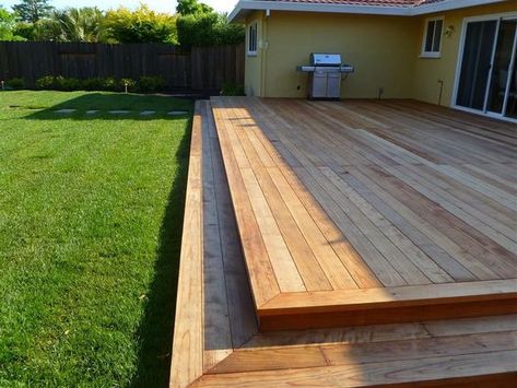 Low deck with two steps. I love how this is simple, level and runs nearly the length of the house. SO much room for entertaining! Deck With Steps, Corner Pergola, Backyard Patio Deck, Low Deck, Patio Grande, Floating Deck, Patio Deck Designs, Pergola Ideas, Wooden Deck