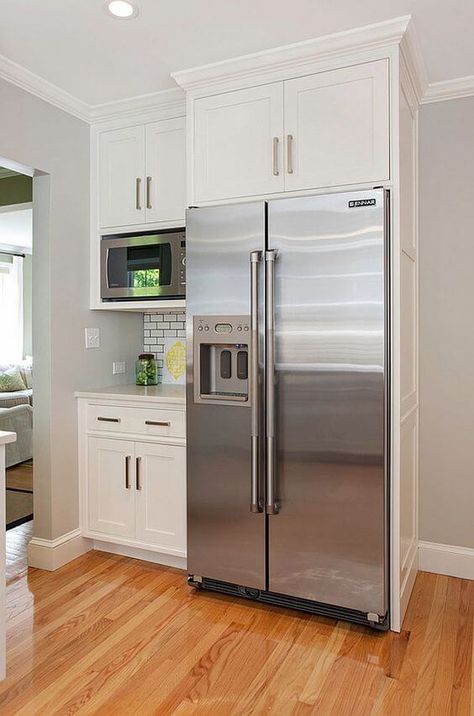 As you can see, it isn’t too hard to fit cabinets around the refrigerator in an efficient way! More decor and other interesting ideas at hackthehut.com Modern Refrigerator, Kitchen With White Cabinets, Microwave Cabinet, Microwave Shelf, Fitted Cabinets, Refrigerator Cabinet, Shelf Cabinet, Kitchen Fridges, Farmhouse Kitchen Cabinets