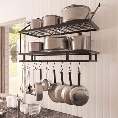 Cookware is cumbersome and difficult to store, so installing a system is essential for an efficient kitchen. Let's look at these Pots and Pans Organizer solutions. Here are 19 items for both cabinets and drawers. Pot And Pans Organization, Kitchen Wall Storage, Kitchen Pans, Pan Storage, Kitchen Wall Shelves, Pot Rack Hanging, Kabinet Dapur, Hanging Rack, Tidy Kitchen