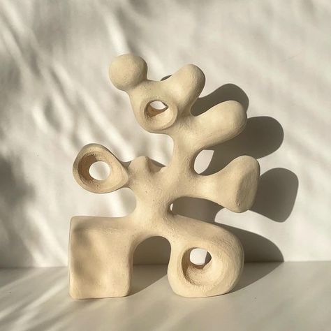 Carmelina | Ceramicist on Instagram: "The Oompa Loompa Sculpture 🤍 Love the White raku abstract sculpture with the organic finish🤍 H/36cm W/28cm #ceramics #pottery #sculptureabstract #sculpture #art #abstractart #oneofakind #unique #homedecor #decorhomestyle #interiordesign #interiorstyling #unglazedceramics #unglazed" Ceramics Abstract Sculpture, Abstract Ceramics Pottery, Subtractive Clay Sculpture, Clay Sculpture Art Project Ideas, Abstract Pottery Sculpture, Ceramics Ideas Sculpture, Abstract Clay Sculpture Ideas, 3d Sculpture Art, Abstract Ceramic Art