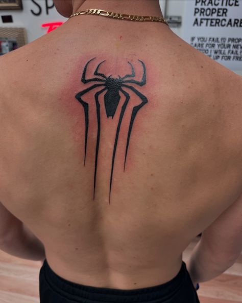 Been a bit behind on posting on this account recently, so no time like the present to start getting this caught up! A few weekends ago, at 43 years old, I got my first tattoo with my oldest, who was getting his first ink too and wanted us to get matching ones. He picked it out, and as a lifelong Spider-Man fan, I had zero issues with his choice! This tattoo is more than just ink. As he starts college this week, and turns 18 next month, this tattoo essentially marked the end of “his weekend... Spider Man Back Tattoo, Spider Man Spider Tattoo, Spiderman Back Tattoo, Spider Back Tattoo, Marvel Sleeve Tattoo, Cool Tattoos Men, Tatto For Man Men Tatoo, Spiderman Tattoo For Guys, Spider Man Tattoo Ideas