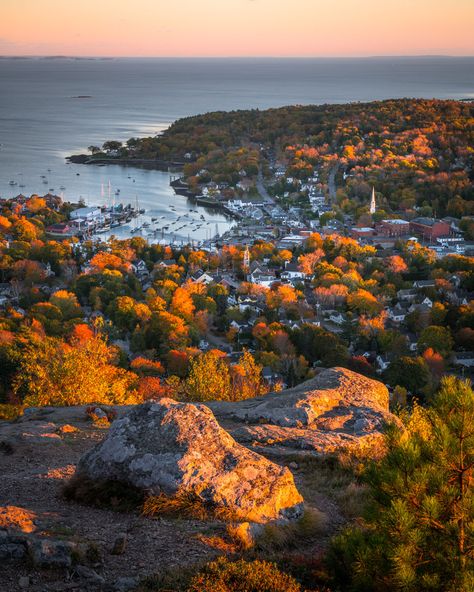 The last bit of fall foliage shines brightly in Camden, Maine, as the setting sun created some beautiful glowy highlights on the landscape. 🍂  📷 Benjamin Williamson   Sign up for our Snapshot newsletter for more beautiful Maine photography. England Autumn, Maine In The Fall, Fall Scenes, Maine Photography, Camden Maine, Visit Maine, Leaves Falling, Maine Vacation, Maine Travel