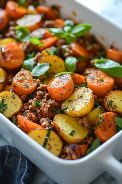 Roasted potatoes and carrots with ground meat and fresh basil in a white baking dish. Grown Turkey Recipes, One Pot Meals Healthy Ground Beef, Healthy Meal Prep For The Week Ground Turkey, The Best Ground Turkey Recipes, Healthy Organic Meals Recipes, Sheet Pan Ground Turkey Recipes, Clean Eating Comfort Food Recipes, Full Plate Living Recipes Meals, Thanksgiving Ground Turkey Recipes