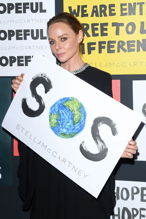 MILAN, ITALY - JUNE 14: Stella McCartney poses with a sign readin 'SOS' during the presentation of Stella McCartney during the Milan Men's Fashion Week Spring/Summer 2020 on June 14, 2019 in Milan, Italy. (Photo by Daniele Venturelli/Getty Images) Caroline Jones, Milan Men's Fashion Week, Powder Detergent, Rule Of Thumb, Baby Shampoo, Bespoke Tailoring, Promotional Video, Design Course, When You Love