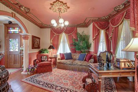 Queen Anne Victorian Comes With 1880s Decor and Income Opportunity | realtor.com® Queen Anne Victorian House Interior, Queen Anne Victorian House, Queen Anne House, Queen Anne Victorian, Victorian Parlor, Victorian Living Room, Pink Victorian, Victorian Interiors, Opulent Interiors