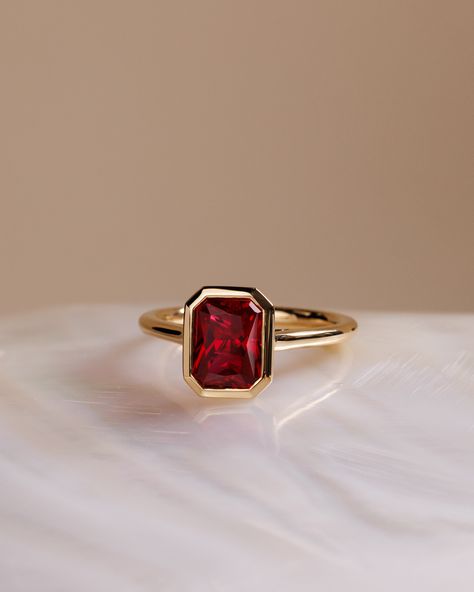 Add some colour to your ring stack❤️⁠ ⁠ The most stunning red sapphire (aka ruby) set into a bezel = obsessed. ⁠ ⁠ ⁠ Ring Details:⁠ Rachel – Bezel Set Radiant Solitaire⁠ 8.5x6.5mm ~ 2.20ct⁠ ⁠ Bezel Set Ring Stack, Bezel Ruby Ring, Bezel Set Gemstone Ring, Ruby Ring Stack, Ruby Bezel Ring, Bezel Set Sapphire Ring, Colourful Engagement Rings, Sapphire Bezel Ring, Red Sapphire Ring