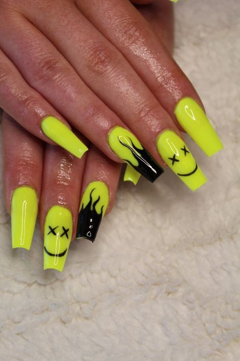 Hand painted neon yellow coffin / ballerina nails for festival or rave with fire and smiley Neon Yellow Acrylic Nails Designs, Rave Acrylic Nails, Neon Yellow And White Nails, Neon Drip Nails, Neon Rave Nails, Neon Coffin Acrylic Nails, Download Festival Nails, Neon Festival Nails, Black Festival Nails