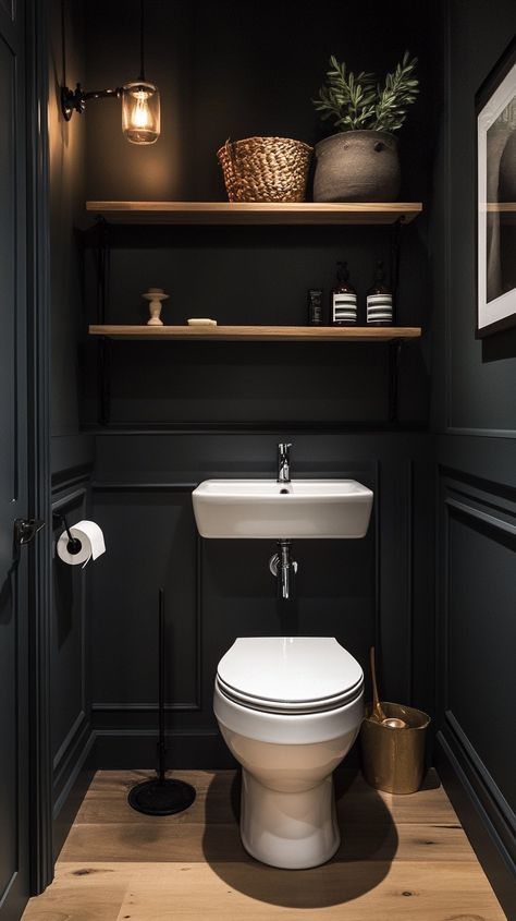 30 Brilliant Half Bathroom Decor Ideas Small Half Bathroom Vanity, Small Bathroom Ideas Half Tile, Floating Shelves In Half Bathroom, Black And Wooden Bathroom Ideas, Small Toilet Room Uk, Small Bathroom Dark Paint Ideas, Black Small Toilet, Half Bath Black Walls, Half Bath Aesthetic