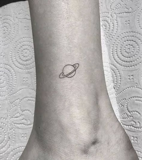 Saturn Wave Tattoo, Saturn Simple Tattoo, Simple Jupiter Tattoo, Small Moon And Saturn Tattoo, Minimalist Tattoo Saturn, Saturn Tattoo Fine Line, Saturn Outline Tattoo, Dainty Saturn Tattoo, Minimalist Universe Tattoo