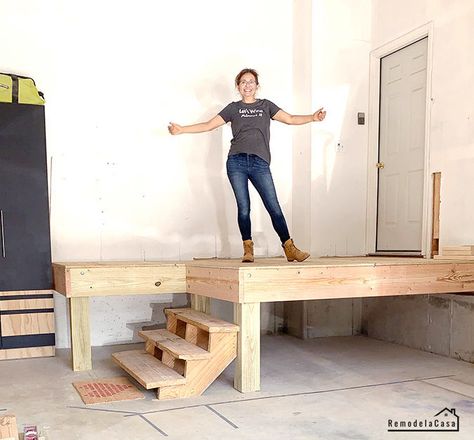 How to build a garage platform - #thdprospective Entryway Stair Storage, Steps Into House From Garage, Garage Entry Steps, Garage Conversion To Laundry Room, Garage Steps Into House Diy, Steps Going Into House From Garage, Garage Stairs With Landing, Build Laundry Room In Garage, Steps In Garage To House