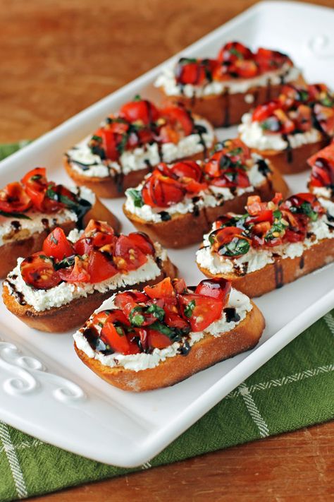 Tomato and Goat Cheese Bruschetta - Emily Bites Bread With Tomatoes And Cheese, Tiny Bites Appetizers, Birthday Snacks Healthy, Tomato Cheese Skewers, Appetizer Recipes Bread, Small Orderves Party Appetizers, Cheesy Bruschetta Bites, Pasta Bites Appetizers, Christmas Bruchetta