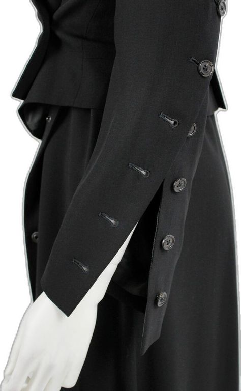 Ann Demeulemeester black jacket with buttons twisting around the sleeves — fall 2010 - V A N II T A S Button Detail Fashion, Ann Demeulemeester Jacket, Feminine Streetwear, Utilitarian Style, Archive Fashion, Clothing Details, Dress Coat, Mood Board Fashion, Ann Demeulemeester