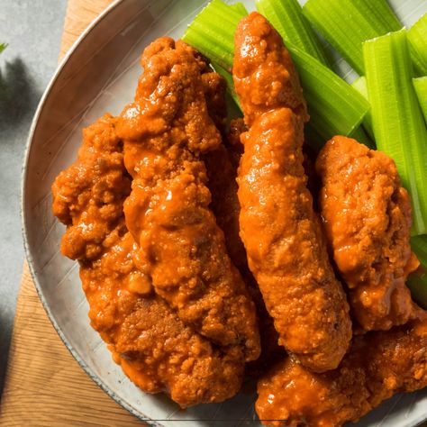 Buffalo Chicken Tenders | Spicy Chicken Strips - TwoSleevers Spicy Chicken Strips, Air Fryer Buffalo Chicken Tenders, Buffalo Chicken Strips, Spicy Chicken Tenders, Air Fryer Buffalo Chicken, Buffalo Chicken Tenders, Air Fryer Chicken Tenders, Favorite Recipes Chicken, Stove Top Recipes