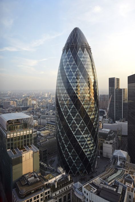 Exterior view of the London Gherkin | The Gherkin, London |  The Gherkin tower |  London skyscrapers | Gherkin London, The Gherkin, Elsie De Wolfe, London Buildings, Foster Partners, Tall Buildings, Norman Foster, London Architecture, Skyscraper Architecture