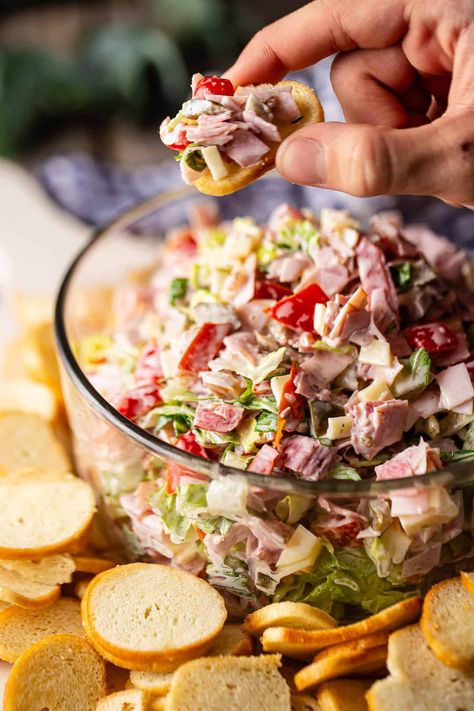 An old favorite! This easy hoagie dip recipe is just like an Italian sub, but in dip form! Loaded with hearty meats, cheese, and veggies. Chopped Italian Dip, Lunch Dips Easy Recipes, Italian Hoagie Salad Recipes, Italian Hoagie Dip Recipe, Antipasto Dip Recipe, Sub Salad Italian, Italian Sub Dip Recipe, Meat Dip Recipes, Grinder Dip