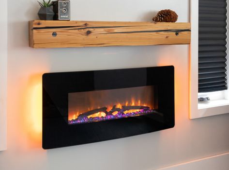 Electronic Fireplace Living Rooms, Wall Hanging Fireplace, Dimplex Electric Fireplace, Electric Fireplace Living Room, Electric Fireplace With Mantel, Warm Living Room, Above Fireplace, Wall Mounted Fireplace, Electric Fireplace Wall