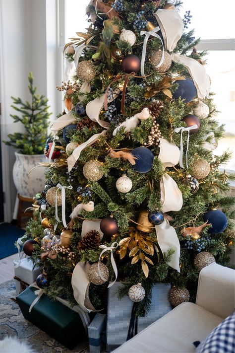 ehdesignmn's Christmas Tree Collection on LTK Navy And Brass Christmas Tree, Navy Xmas Tree, Navy Bronze Christmas Tree, Blue And Burlap Christmas Tree, Navy And Cream Christmas Tree, Ginger Jar Christmas Tree, Blue Christmas Home Decor, Navy And Green Christmas Tree, Classic Vintage Christmas Decor