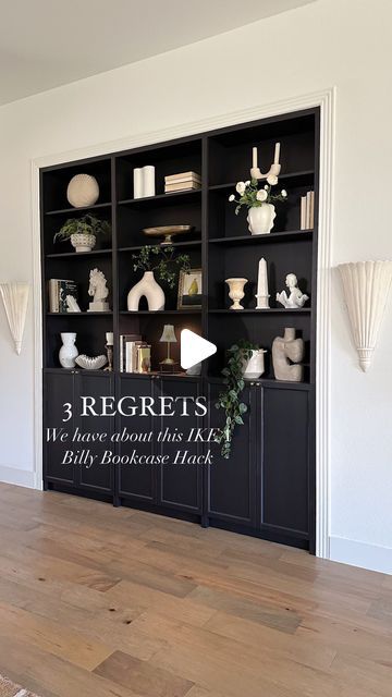 Alexa Mason & Elizabeth Novoa | Neutral Home Decor on Instagram: "Here are our 3 biggest regrets when it comes to this IKEA Billy Bookcase hack: 1. Buying white bookcases when we were going to paint them black. Unfortunately we hadn’t made the decision of whether or not we were going to paint them yet, so we went with white since we thought we might leave them white. If we had known for sure we’d be painting them black, we would have bought the dark brown color since any scratches wouldn’t be as noticeable. 2. Buying glass panel doors then trying to paint them. Unfortunately when we painted the original glass panel doors we purchased for this project, paint seeped in between the glass and the frames unevenly. There was really no fixing the paint job and we ended up having to totally scra Ikea Built In Billy Bookcase, Bookcase Hacks Ikea, Ikea Library Ideas Billy Bookcase Hack, Billy Bookcase Drawer Hack, Billy Bookcase With Doors Hack, Ikea Billy Paint, Black Billy Bookcase Hack, Ikea Havsta Bookcase, White Billy Bookcase Black Doors