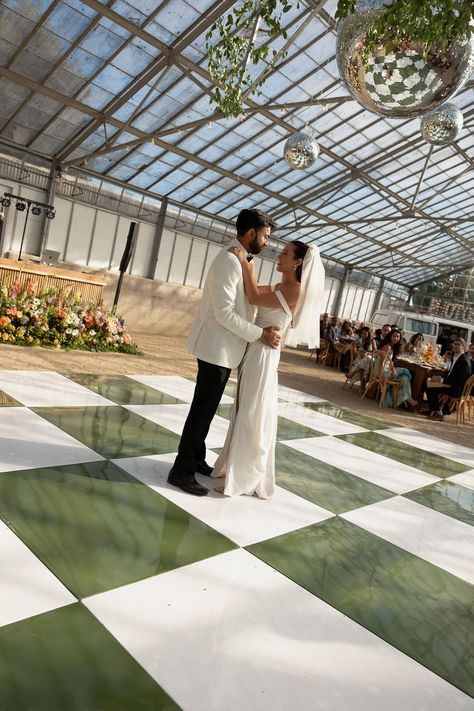 Olive and ivory checker board dance floor? Yes please! Team: 🤍 Planning + Design: @detailsdarling @kenzie_swift Lead photo: @photographywithnatalie Assistant photo: @loveyou.nadine Hair & MUA: @samarabeautysb DJ: @secondsong_official Florals: @flora_fauna_design Rentals: @casadeperrin @foundrentalco @partypleasers Catering: @fieldtotableevents Bar: @simplycocktails Cake: @roxannerosensteel Bus: @shutterbusco Signage: @velvetfoxdesigns Dance floor: @rcddancefloors Vintage car: @marshy_motors... Tile Dance Floor Wedding, Green Checkered Dance Floor, Flowers Over Dance Floor Wedding, Outside Wedding Dance Floor, Tan And White Checkered Dance Floor, Checkerboard Dance Floor Wedding, Dancing Floor Wedding, Checkered Dancefloor, Checkered Dance Floor Wedding