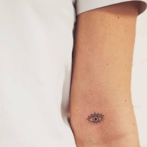 Bicep Tattoo Women Minimalist, Evil Eye Tattoo On Arm, Evil Eye Micro Tattoo, Evil Eye Linework, Eye Finger Tattoos For Women, Evil Eye Shoulder Tattoo, See No Evil Eye Tattoo, Eye Love You Tattoo, Pretty Evil Eye Tattoo