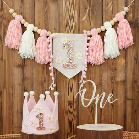 PRICES MAY VARY. 🌼【PACKAGE CONTENTS】🌼 A tasseled garland banner with the number "1" and daisy motifs in white and pink, a pink crown hat with daisy motifs and the number "1", a "one " cake topper. The set is beautifully coloured and fits perfectly with the daisy theme. Add a touch of colour to your baby's birthday party. 💝【APPLICABLE OCCASIONS】💝Widely applicable occasions. This package is perfect for baby birthday parties, bohemian theme parties, daisy theme parties, studio props, baby showe Wildflower Baby Birthday Party, Girls Just Wanna Be One Birthday Theme, Girls Just Wanna Be One Birthday, One Derful First Birthday Girl, 1 Birthday Girl Theme, First Birthday Girl Decorations, Onederful Birthday Party Girl, Daisy First Birthday Theme, Boho Rainbow Birthday Party