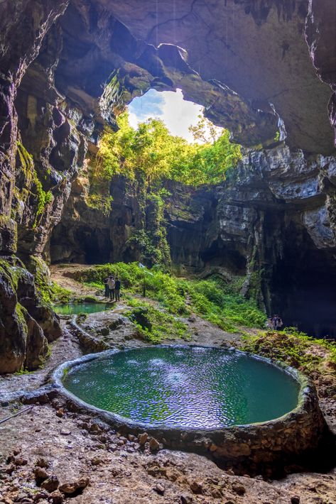 A visit to Wengjin Cave offers an immersive experience into an ancient world, where the intricate designs of nature are displayed in full splendor. The cave environment provides a cool respite and a mystical ambiance, making it a perfect spot for adventure and exploration. Caves With Water, Cave Village, Calypso Island, Cave Environment, Desert Cave, Caves And Caverns, Ocean Cave, Water Cave, Mountain Cave