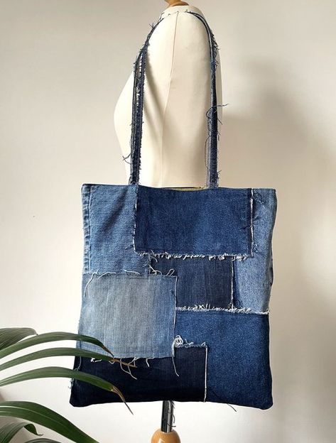 Handmade Reversible Patched Denim Tote Bag #recyclejeans #recyclejeansprojects #recyclejeansbagpattern Bag From Recycled Materials, Denim Patchwork Bag Diy, Jean Patchwork Bag, Recycled Tote Bags, Recycled Bags Diy, Denim Patchwork Tote Bag, Denim Pockets Projects, Upcycled Denim Bag, Upcycled Tote Bags