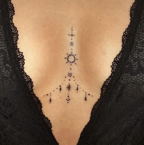 Chandelier Tattoos For Women Chest, Tattoos In The Middle Of Chest Women, In Between Breast Tattoos For Women, Tattoo Breastbone Women, In Between Chest Tattoo Female Simple, Tattoo Middle Of Chest Women, Tattoo Ideas Sternum, Dainty Sternum Tattoo, Abdomen Tattoos Women