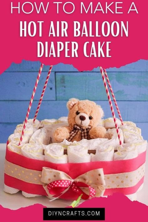 Follow this tutorial for a hot air balloon diaper cake with easy step by step video instructions for making your own baby shower gift! This diaper cake tutorial is an easy baby shower gift idea that also doubles as baby shower decor! Diaper Cake Tutorial Step By Step, Diy Diaper Cake Tutorial, Hot Air Balloon Diaper Cake, Diaper Cake Tutorial, Easy Baby Shower Gift, Diaper Cakes Tutorial, Diaper Cake Instructions, Diy Hot Air Balloons