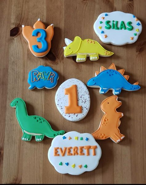 Dinosaur birthday cookies 1st Birthday Dinosaur Cookies, First Birthday Dinosaur Photoshoot, Dinosaur Themed Cookies, Decorating Dinosaur Cookies, Simple Dinosaur Cookies, Easy Dinosaur Cookies, Dinosaur Royal Iced Cookies, Dinosaur Party Cookies, Dinasour Cookies Decorated