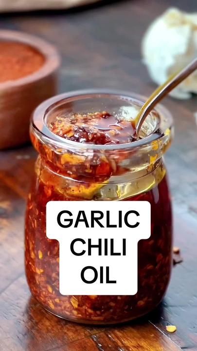 There is a link in my profile for homemade Garlic Chili Oil! #iamhomes... | Chili Oil | TikTok Garlic Oil Recipe, Chinese Chili Oil, Garlic Chili Oil, Chili Oil Recipe, Homemade Chili Recipe, Homestead Recipes, Garlic Sauce Recipe, Homemade Sauce Recipes, Homemade Condiments