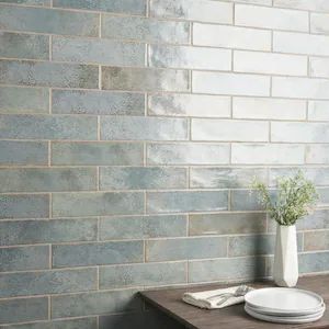 Mandalay Green 2.95 in. x 11.81 in. Polished Ceramic Wall Tile (5.38 sq. ft./Case) Transitional Tile, Glossy Ceramic Tile, Green Backsplash, Ceramic Tile Backsplash, Shower Wall Tile, Backsplash Wall, Kalay, Polish Ceramics, Glazed Ceramic Tile