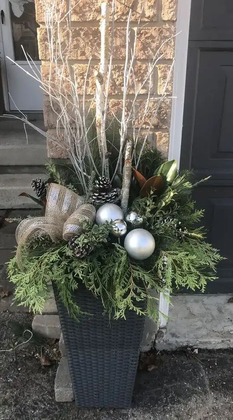 90+ Easy DIY Outdoor Christmas Decorations - HubPages Winter Pot Decorations, Christmas Potted Arrangements, Christmas Outdoor Arrangements, Winter Floral Arrangements Outdoor, Outdoor Winter Planters Front Porches, Holiday Urns Outdoor, Outdoor Christmas Arrangements, Diy Outdoor Christmas Planter, Outdoor Christmas Pots Planters