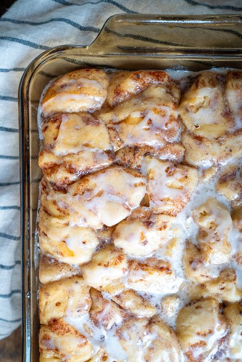 Overnight Cinnamon Roll Casserole | 12 Tomatoes Overnight Cinnamon Roll Casserole Easy, Overnight Sweet Breakfast Casserole, Roll Out Of Bed Bake, Night Before Cinnamon Roll Casserole, Cinnamon Roll Casserole From Scratch, Apple Fritter Cinnamon Roll Bake, Make Ahead Crescent Roll Breakfast, Overnight Dessert Recipes, Grands Cinnamon Roll Casserole